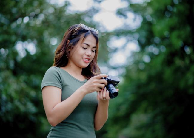 Photograper hiking with camera